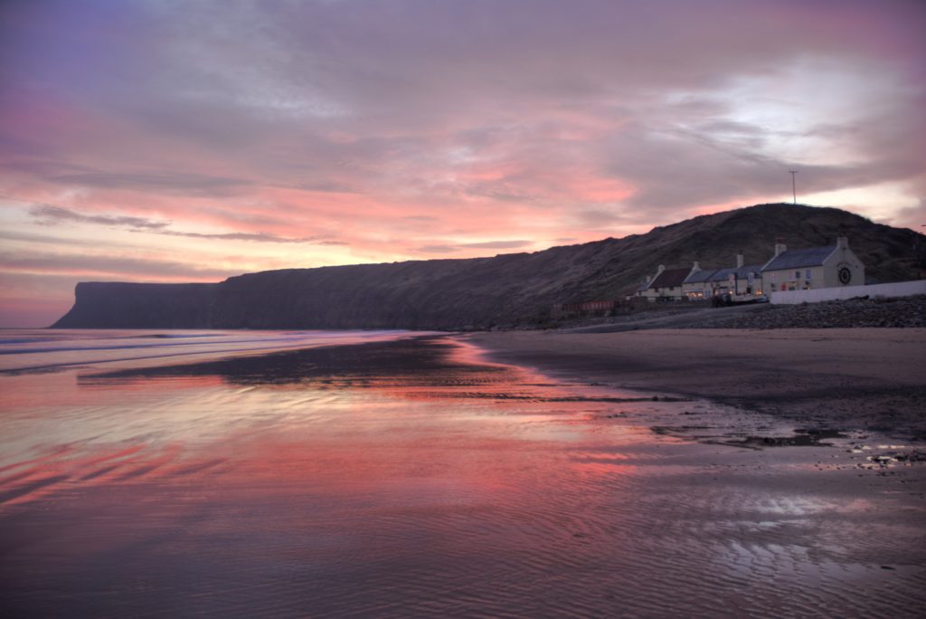 sunrise over a cliff